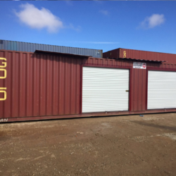 Shipping container with two roll up doors